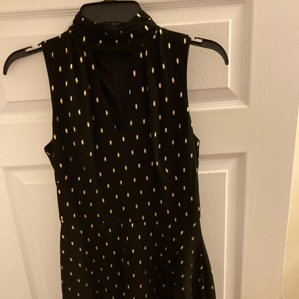 White House Black Market little black halter dress with oblong gold dots.